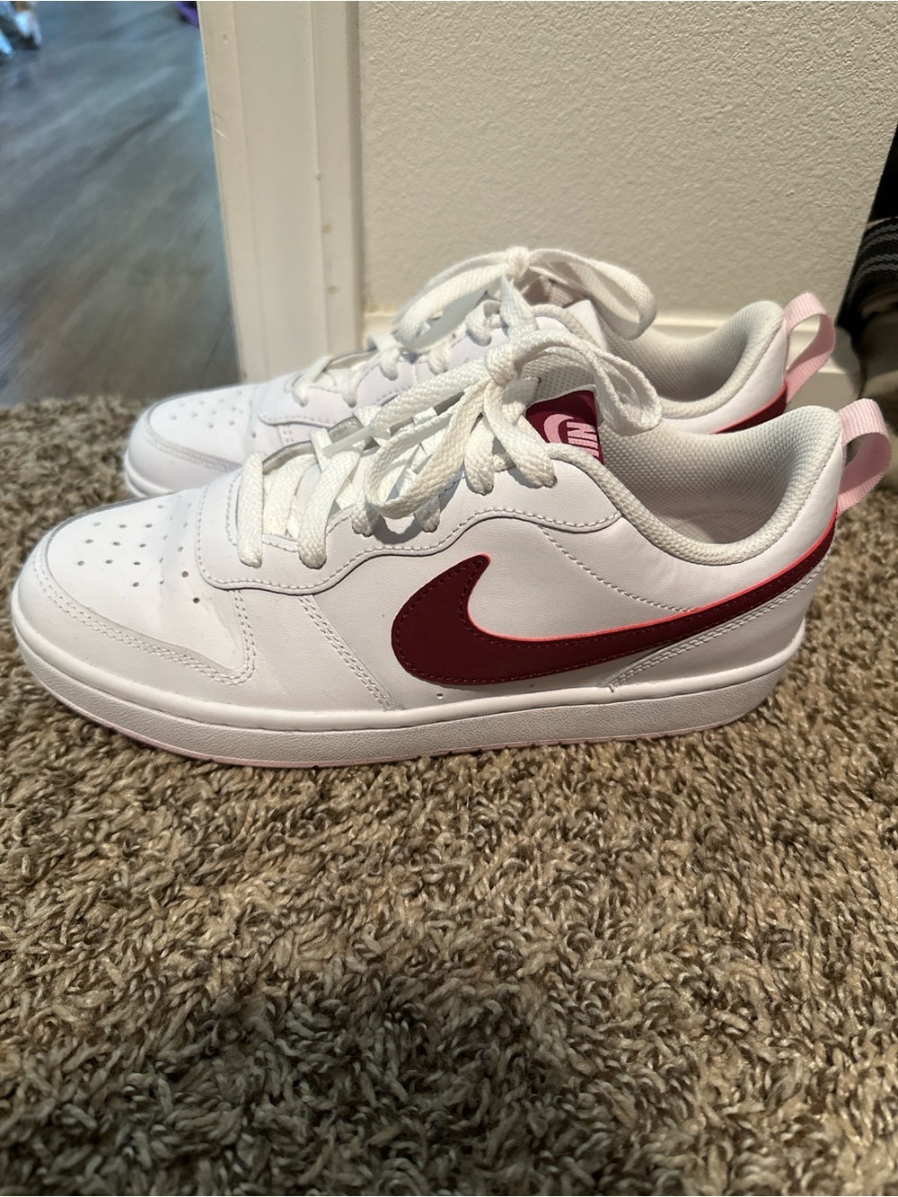 Nike Kids White Sneakers with Maroon Swoosh and Pink Heel Tab